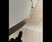 Black gay guy at public urinal stroking cock from gay at toilet