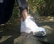 Jon Arteen plays in the mud with his new sneakers Nike Air Force One AF1 sockless. Boy foot fetish gay porn video from gay shoe trample