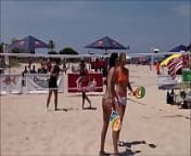 Beach tennis from naked tenis player