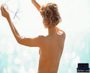 Petite teen model Lilit Ariel outdoor striptease of her tiny bikini from ariel shower