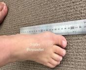 TinySizedFeet Measuring against ruler and common home items, US Size 4, UK Size 1.5, EU 34 tiny feet from ue