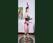 Sports girls, exercise together in Christmas costumes, hula hoop exercises from apurva aro