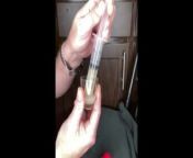 loading a syringe of my thawed cum loads to inject into my wife’s pussy (surprise) from frozen sperm