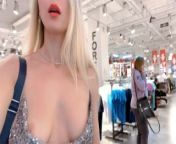 Adorable lady in a sexy dress flashes boobs in a public store. from jane damon